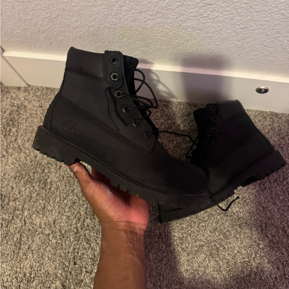 The Timberland 6-Inch Black Nubuck features a black Nubuck